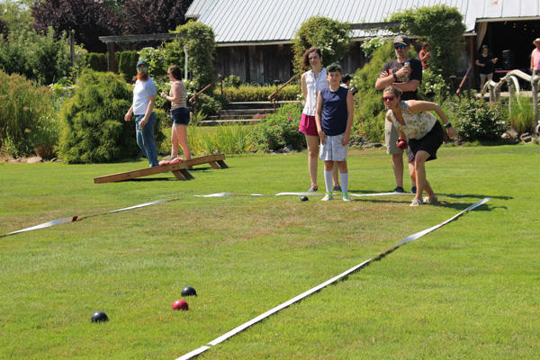 Summer picnic with families playing games